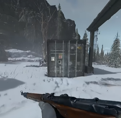 Cliff Near Base Camp shipping container next to a truck (646, 149)